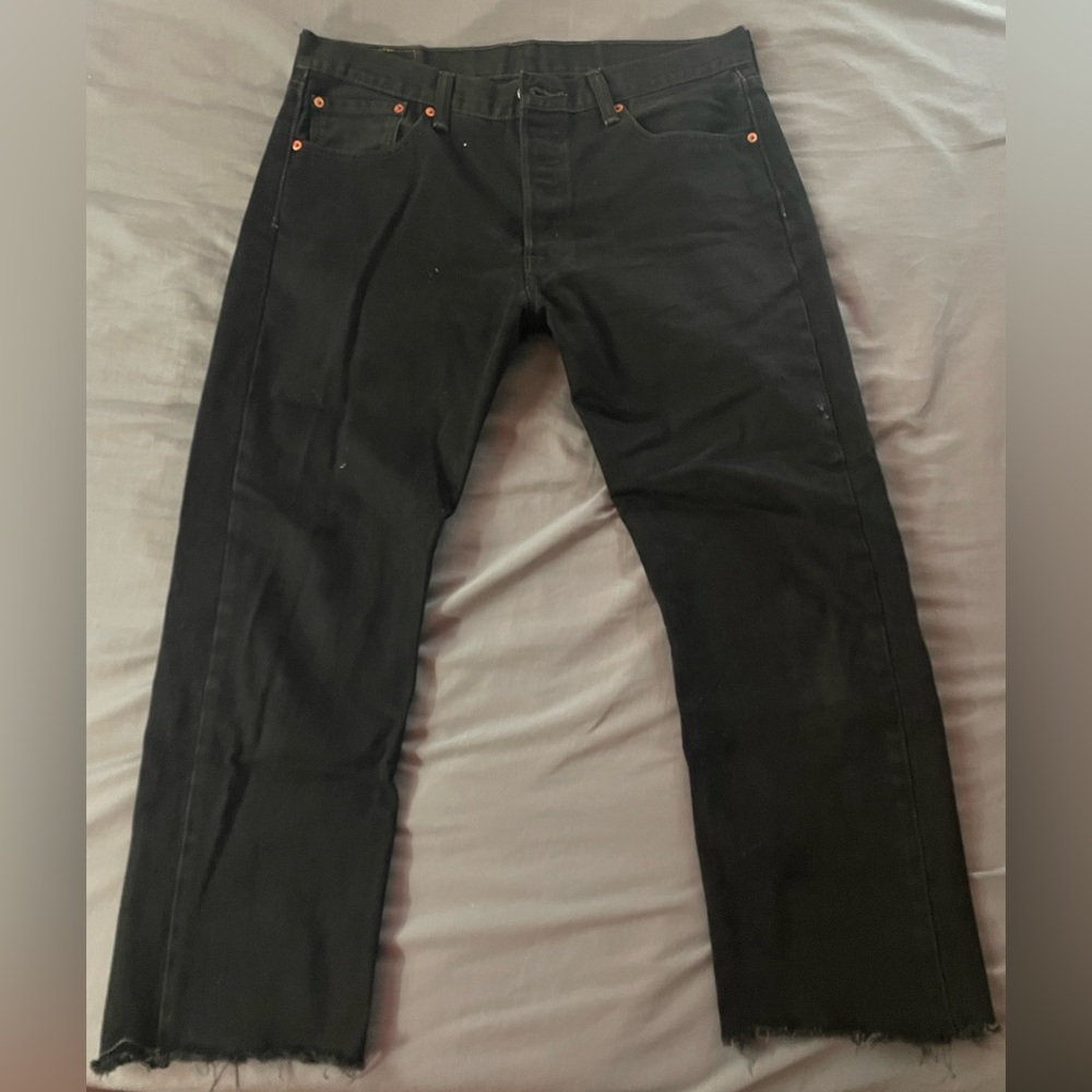 Black Levi 501s straight boyfriend cut with distressed cuffing